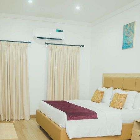 Quest Boutique Hotel Gwarinpa Buitenkant foto