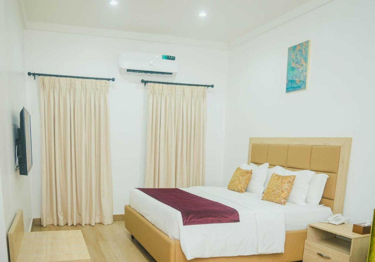 Quest Boutique Hotel Gwarinpa Buitenkant foto