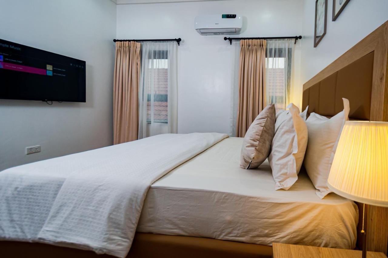 Quest Boutique Hotel Gwarinpa Buitenkant foto