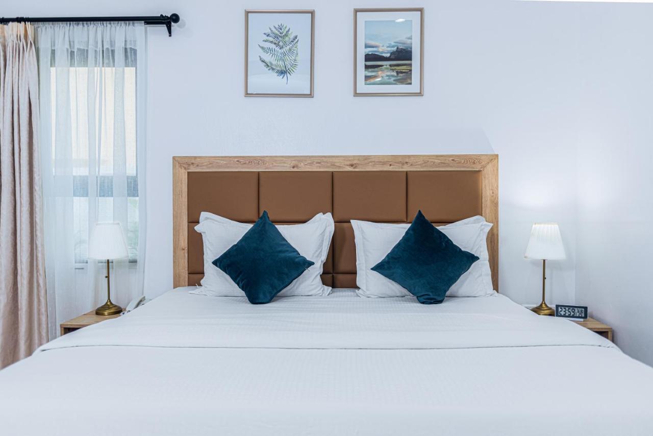 Quest Boutique Hotel Gwarinpa Buitenkant foto