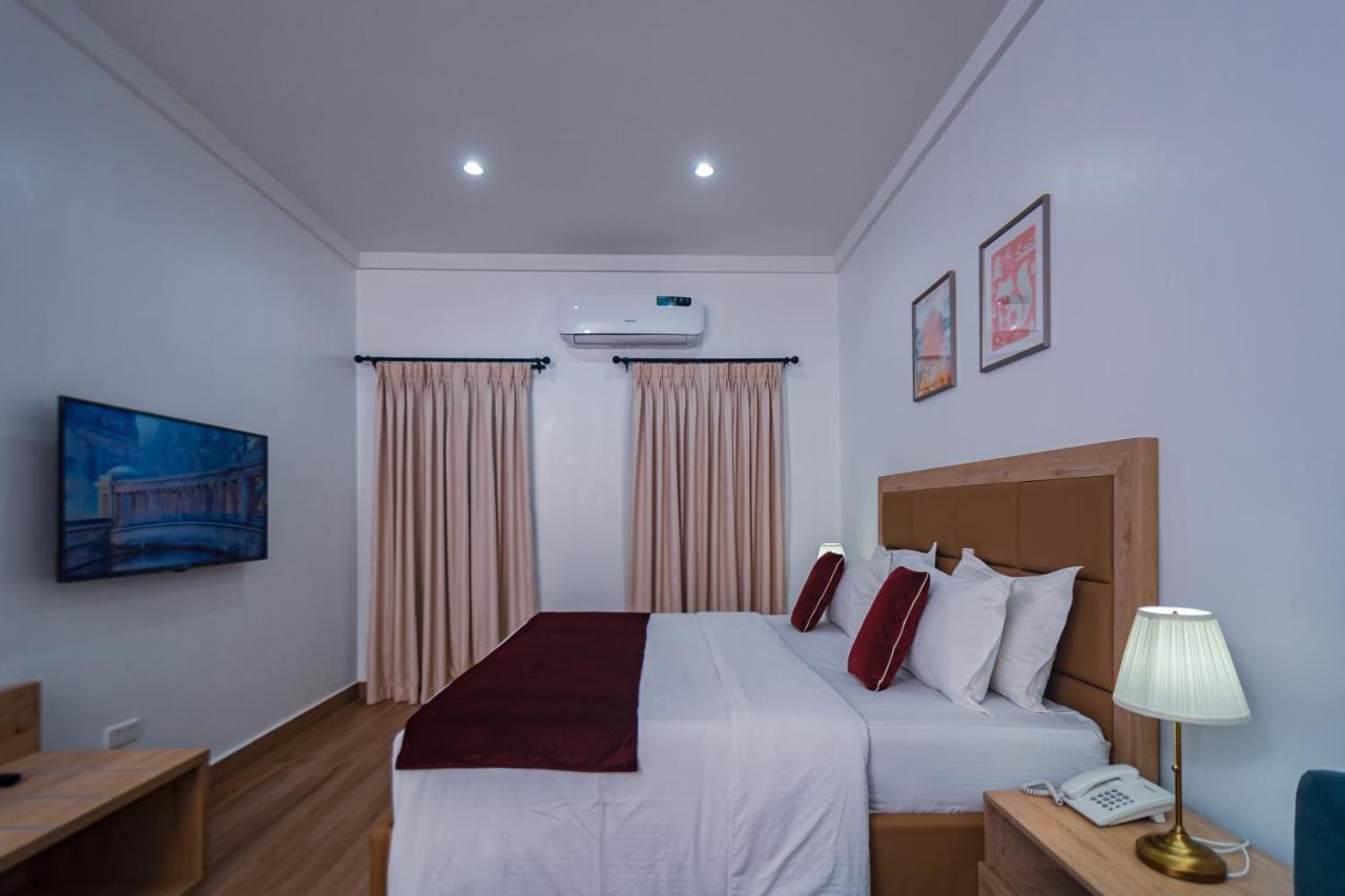 Quest Boutique Hotel Gwarinpa Buitenkant foto