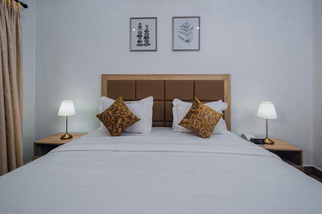 Quest Boutique Hotel Gwarinpa Buitenkant foto